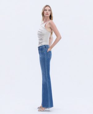 Inspiring – Mid Rise Welt Pocket Pin Tuck Flare Jeans